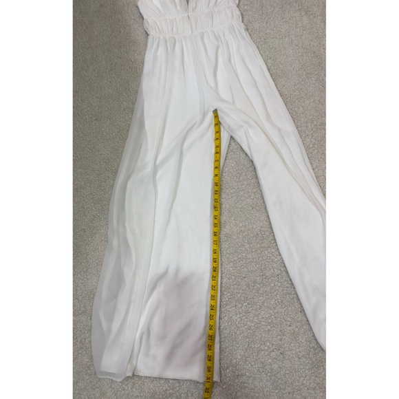 White jumpsuit with ruffles and wide legs - Picture 12 of 14